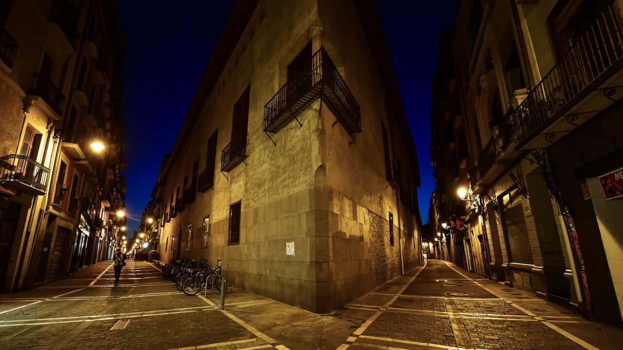A lone pedestrian in Pamplona, Spain
