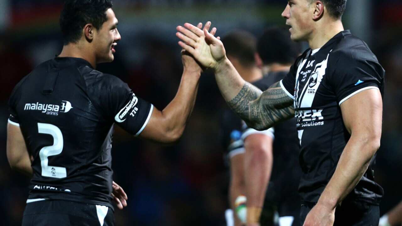 NZ's Sonny Bill Williams (R) celebrates with Roger Tuivasa-Sheck