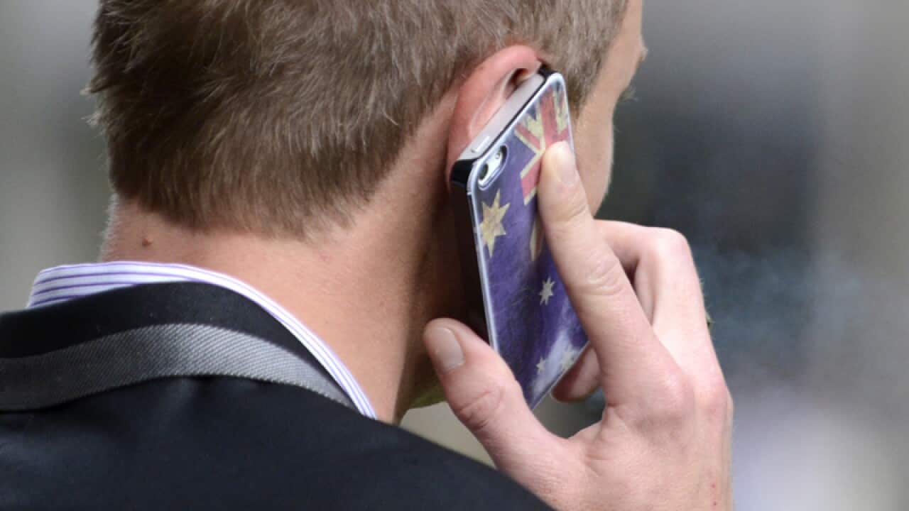A man talks on his mobile phone in Brisbane