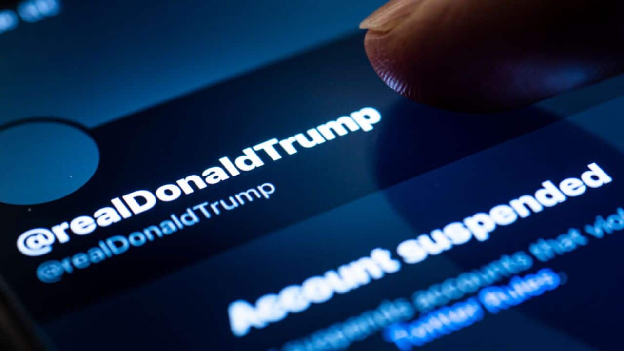  A person tabs on the suspended account of Donald Trump.