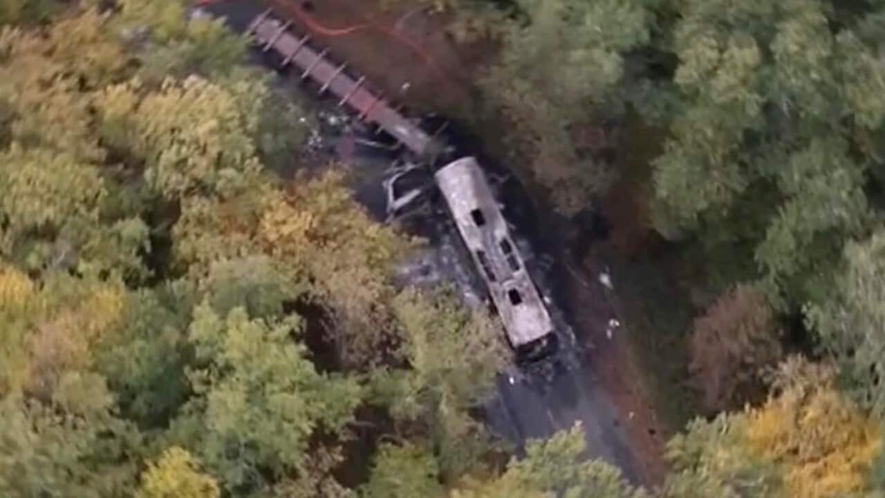 The scene after a truck and a bus transporting retirees on a day trip collided and caught fire Friday in wine country in southwest France