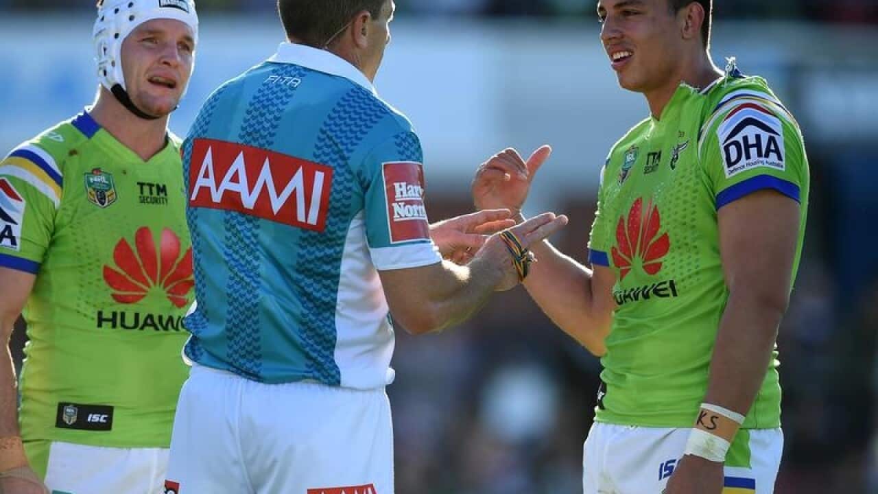 Joseph Tapine of the Raiders, (right), remonstrates with the referee.