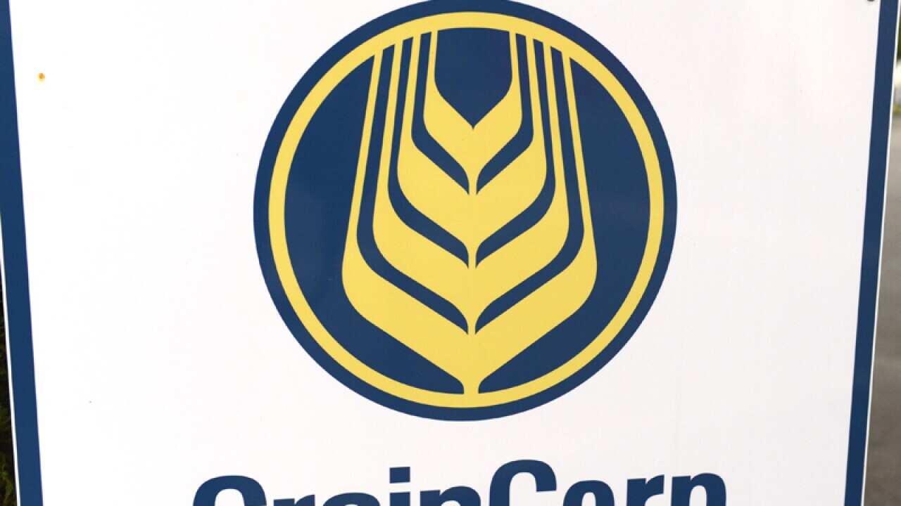 A sign bearing the GrainCorp logo