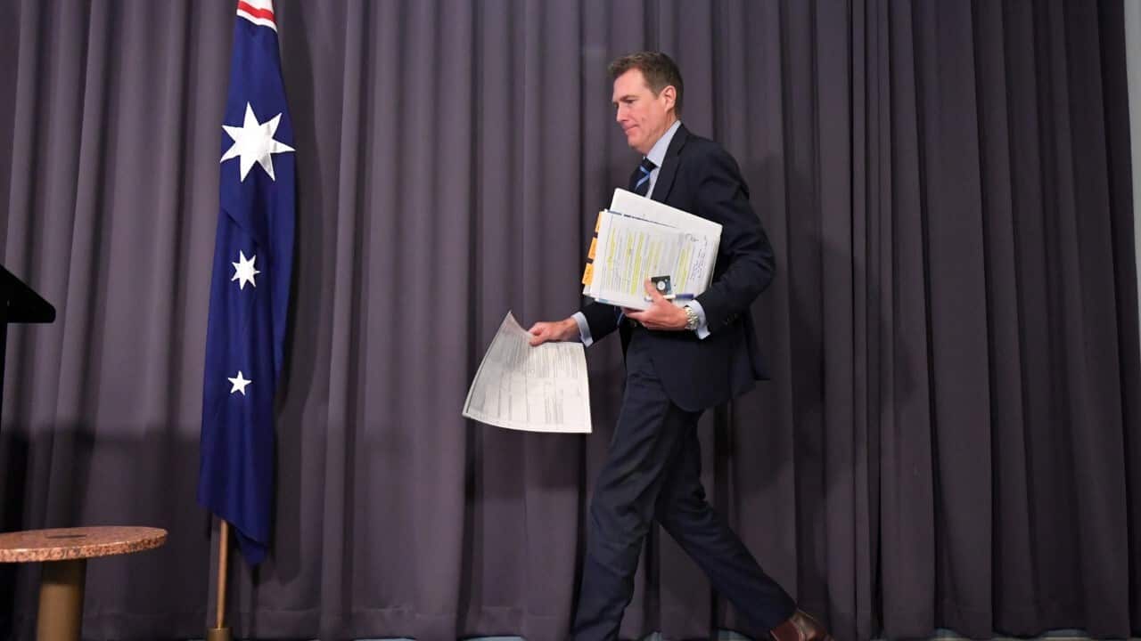 Christian Porter arrives to deliver the report into Australia's intelligence and security laws (AAP)