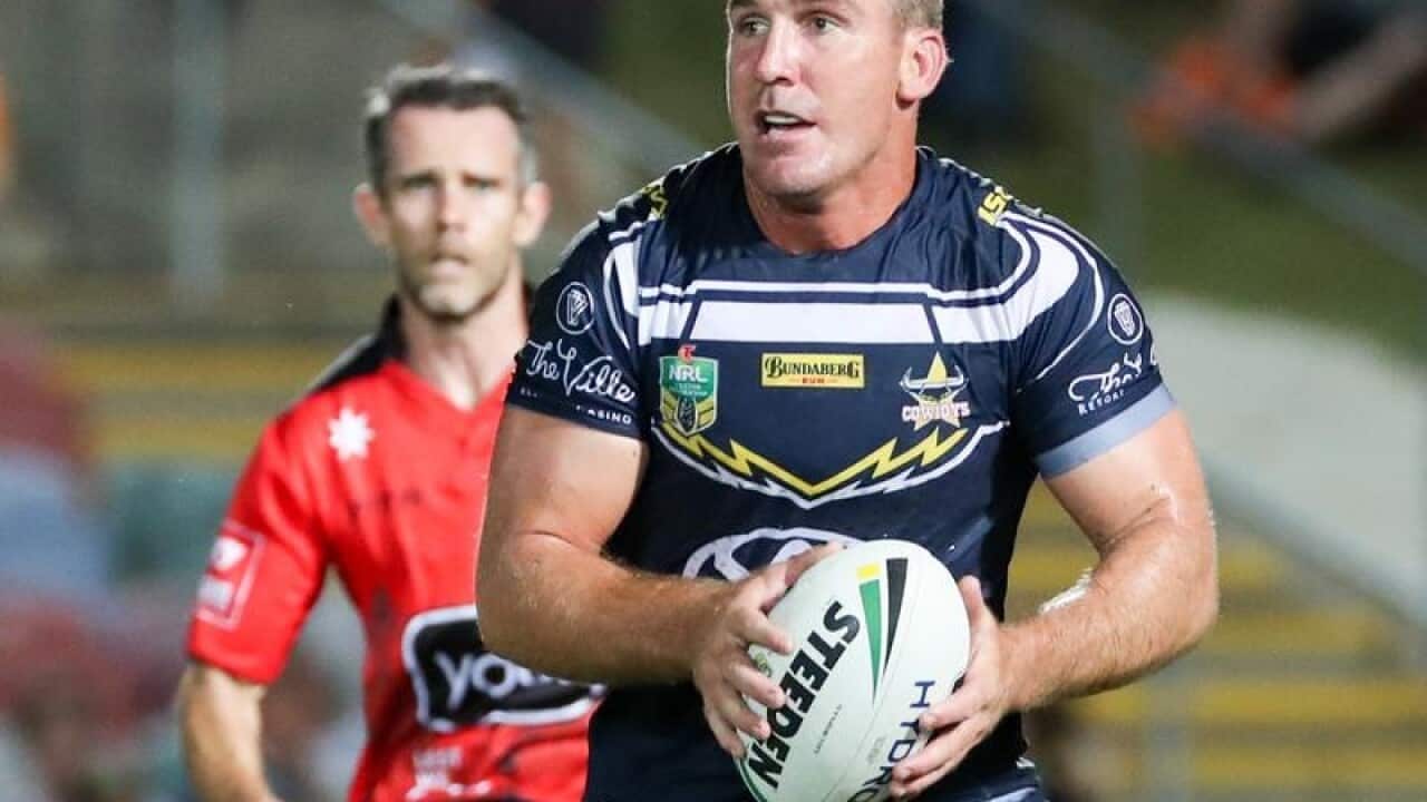 NRL player Scott Bolton of the Cowboys in action.