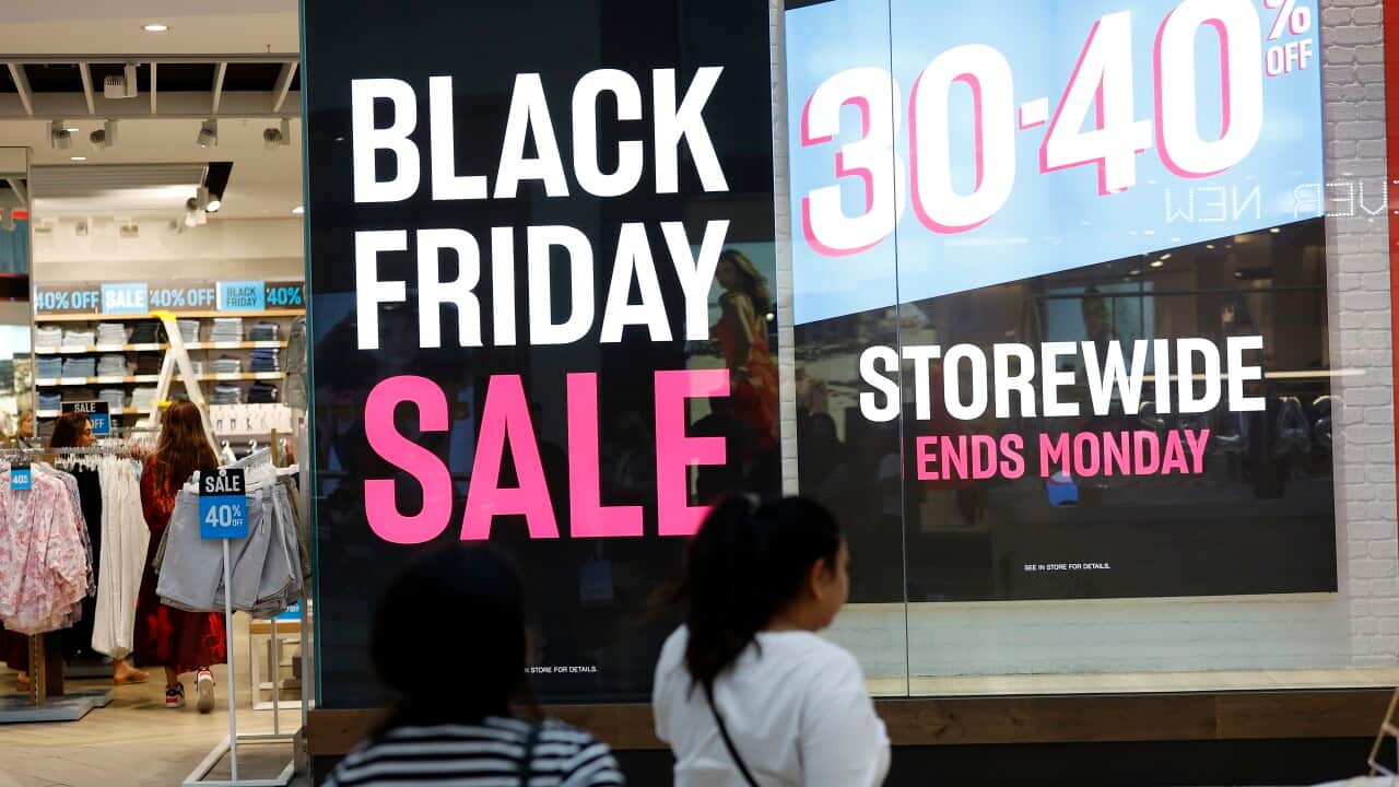 A sign out the front of a store that says “Black Friday Sale“ in big letters.