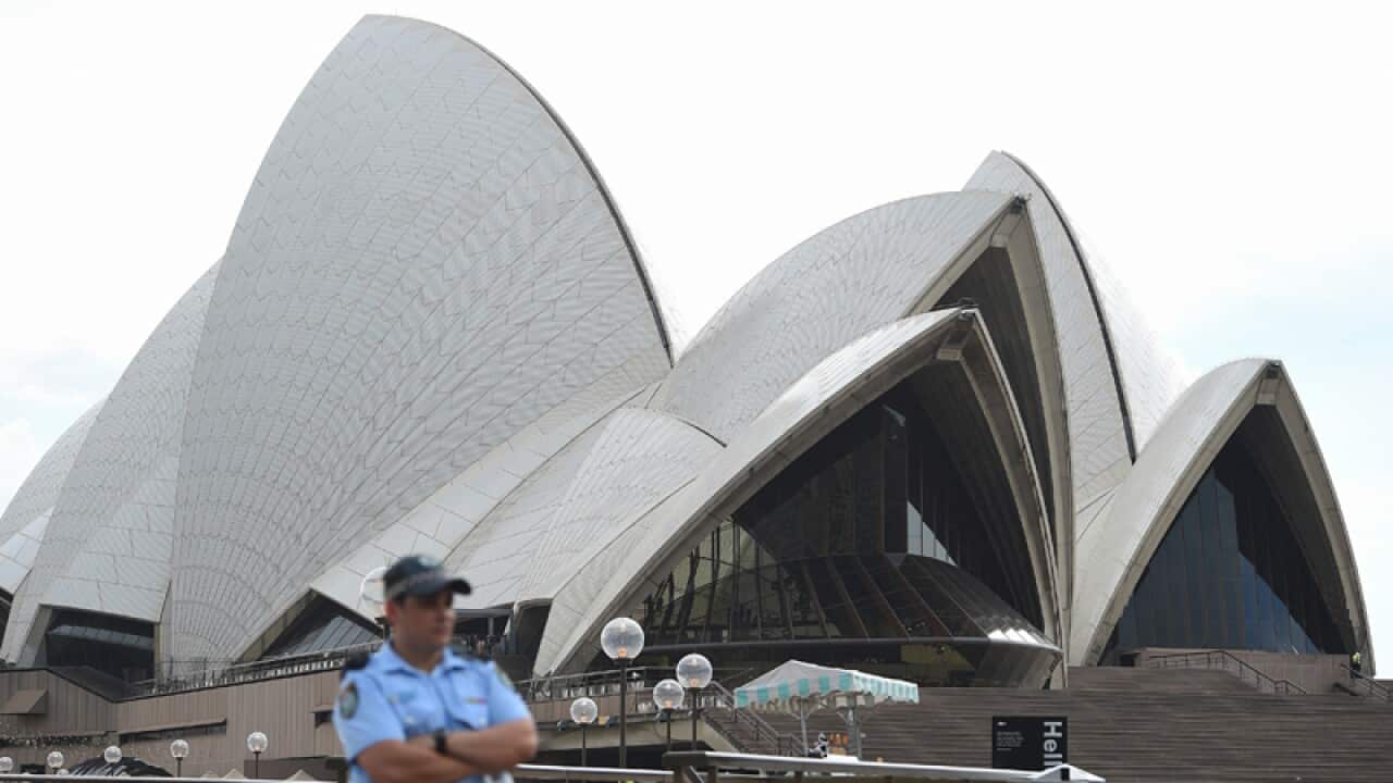 A police officer outside the Sydney Opera House