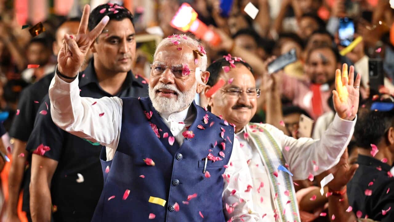 Prime Minister Narendra Modi (C) greets supporters upon their arrival for celebration at BJP HQ on 4 June 2024 in New Delhi, India.