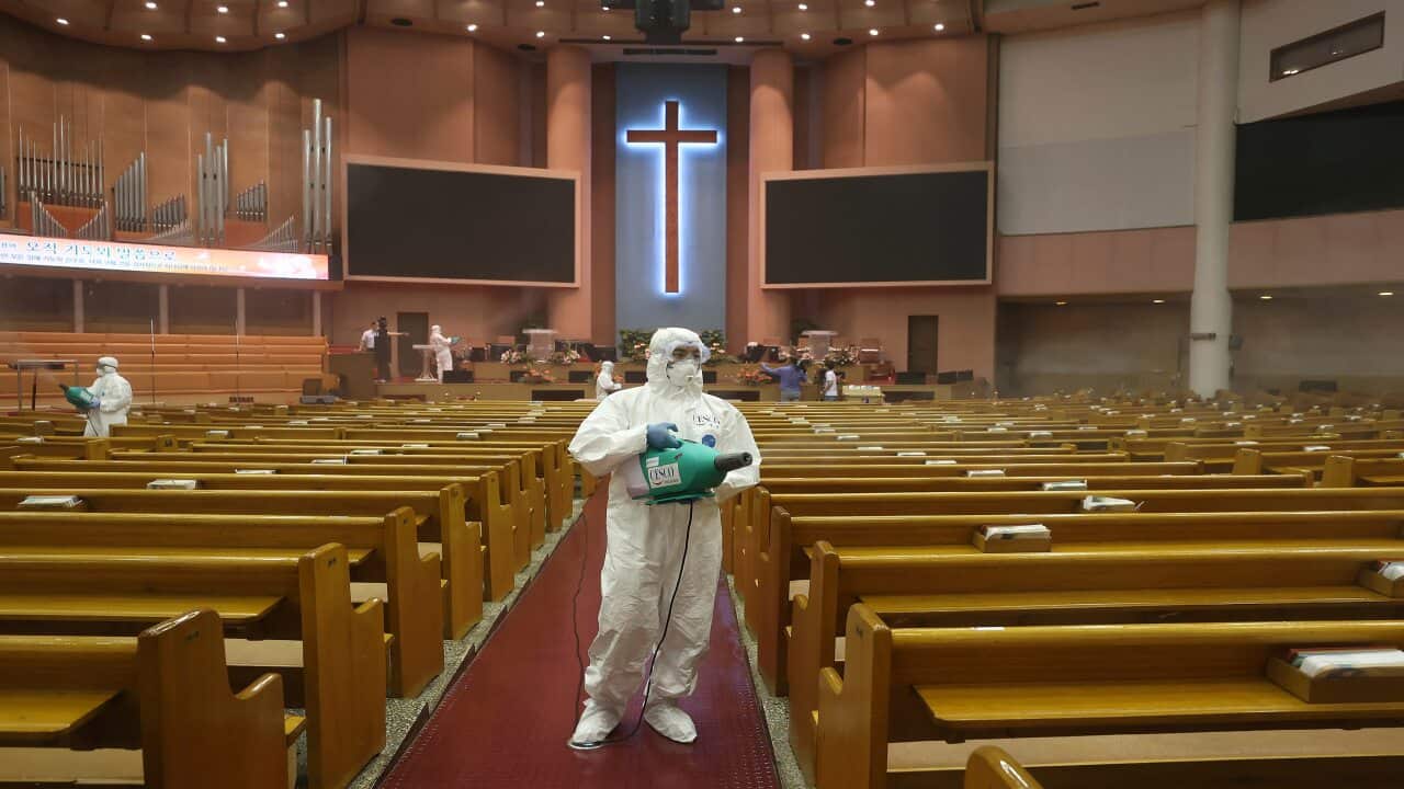 Public officials disinfect as a precaution against the coronavirus at the Yoido Full Gospel Church in Seoul, South Korea.