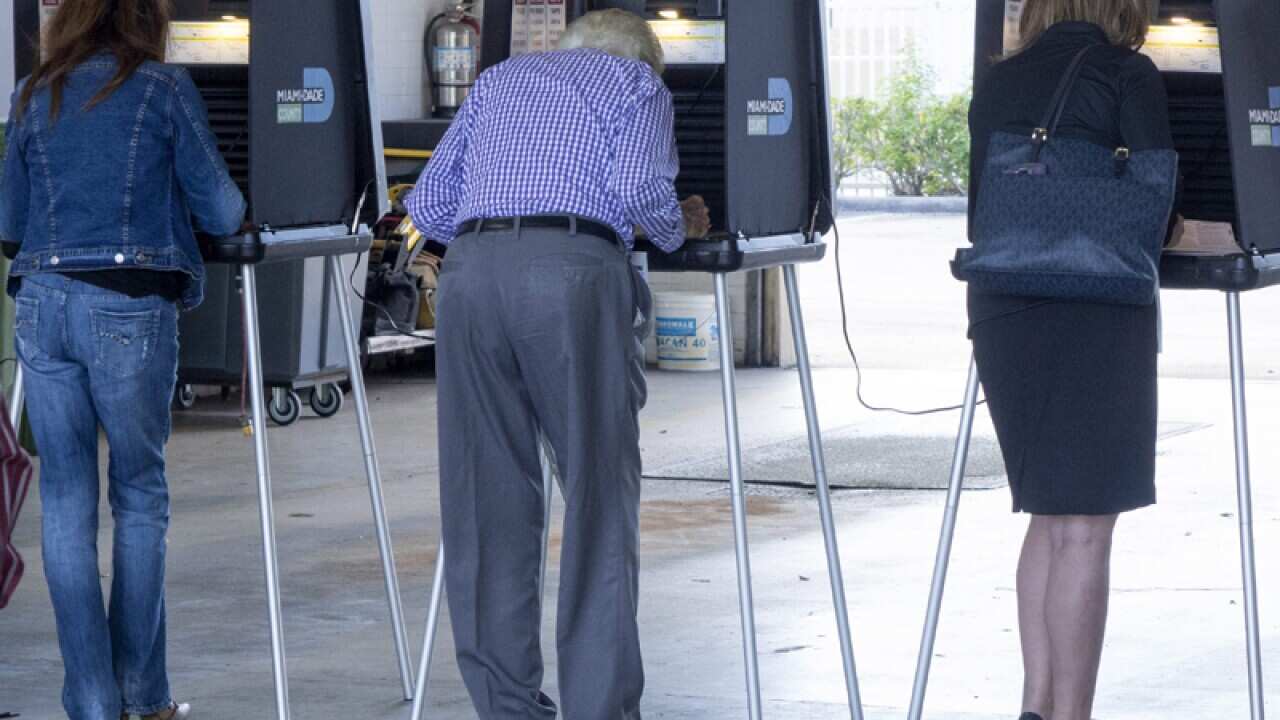 Miami residents cast their ballot