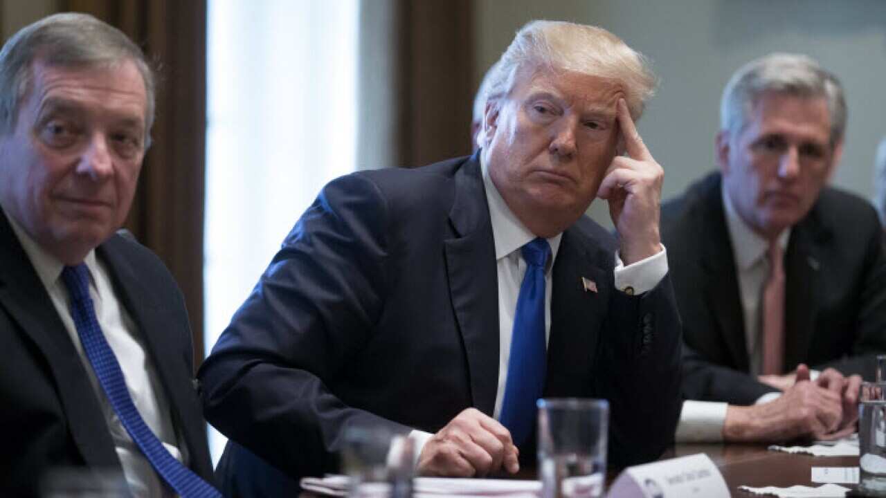 Donald J. Trump participates in a meeting on immigration with bipartisan members of the House and Senate in the Cabinet Room of the White House in Washington, DC, USA