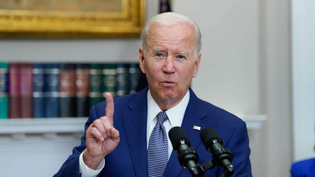 US President Joe Biden in a blue suit.