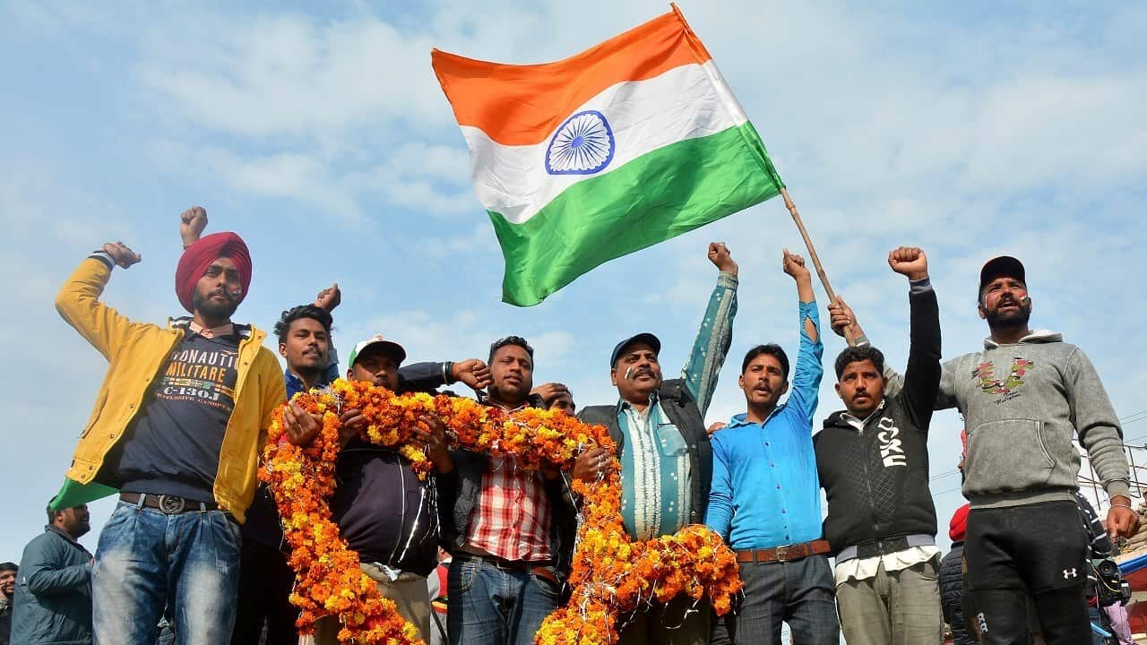 Thousands of Indians gathered at the border to welcome back the captured pilot.