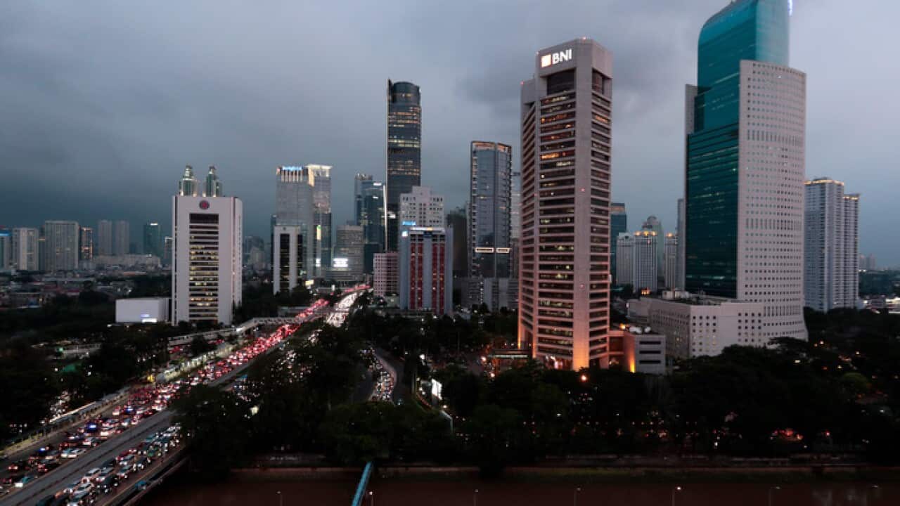 The central business district skyline is seen during the dusk in Jakarta