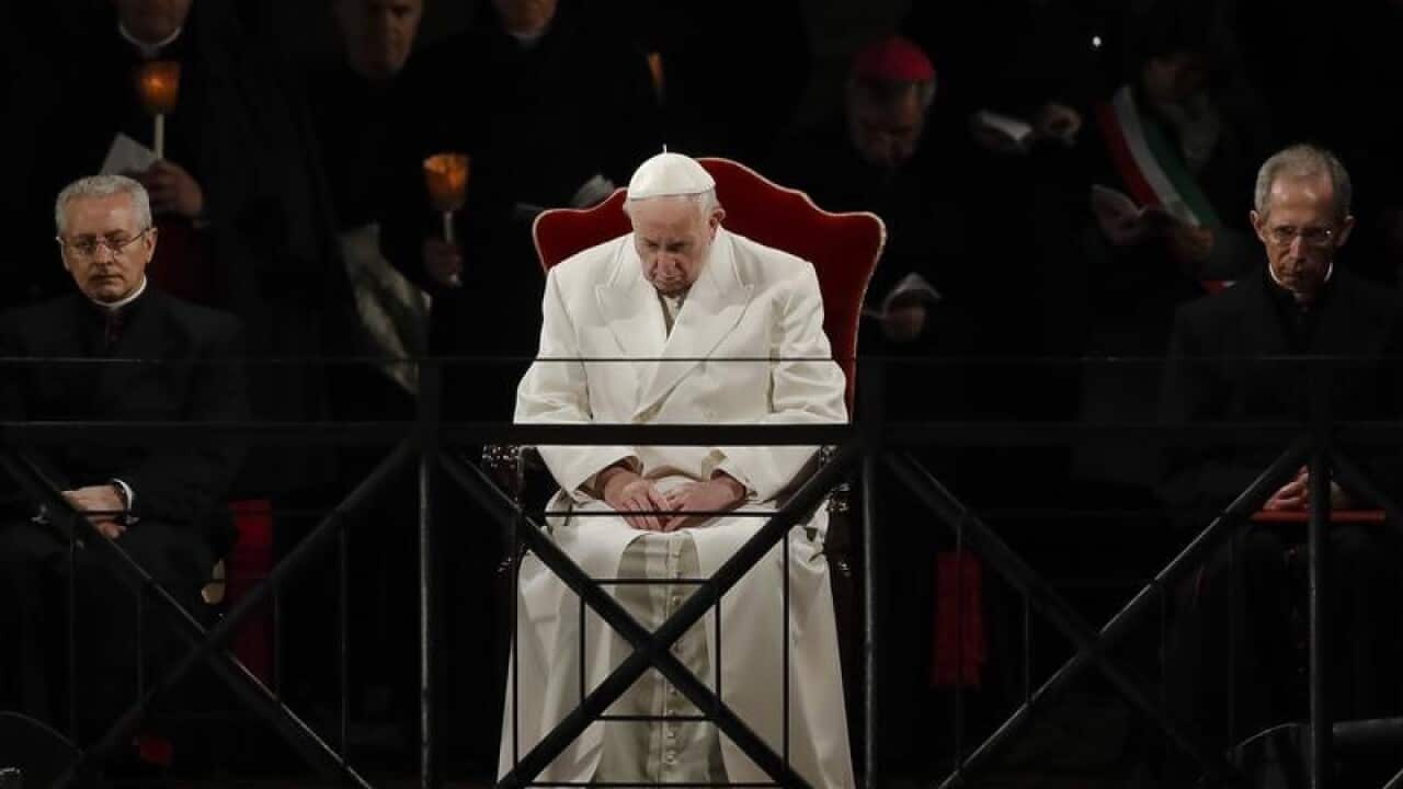 Pope Francis presides over the Via Crucis procession