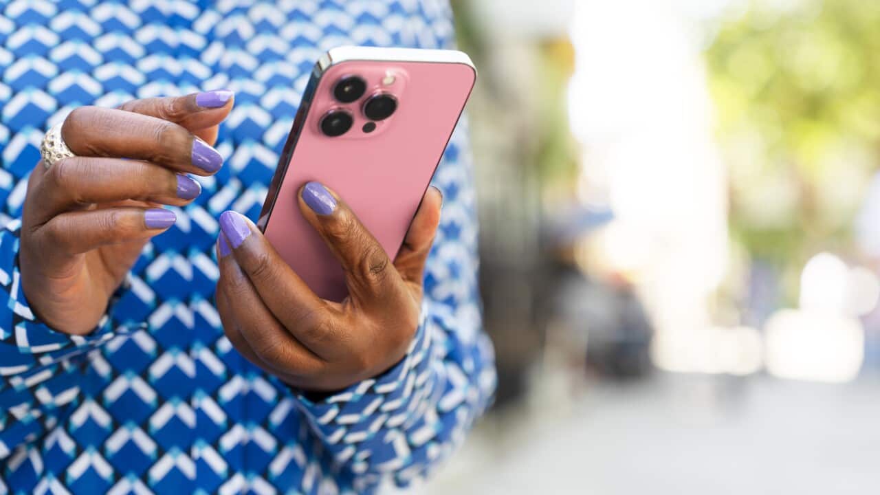 Close up of woman using smart phone