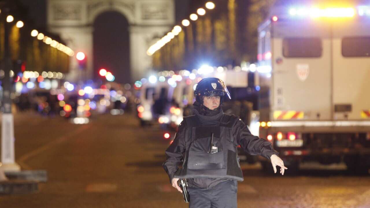 A police officer stands guard after a fatal shooting