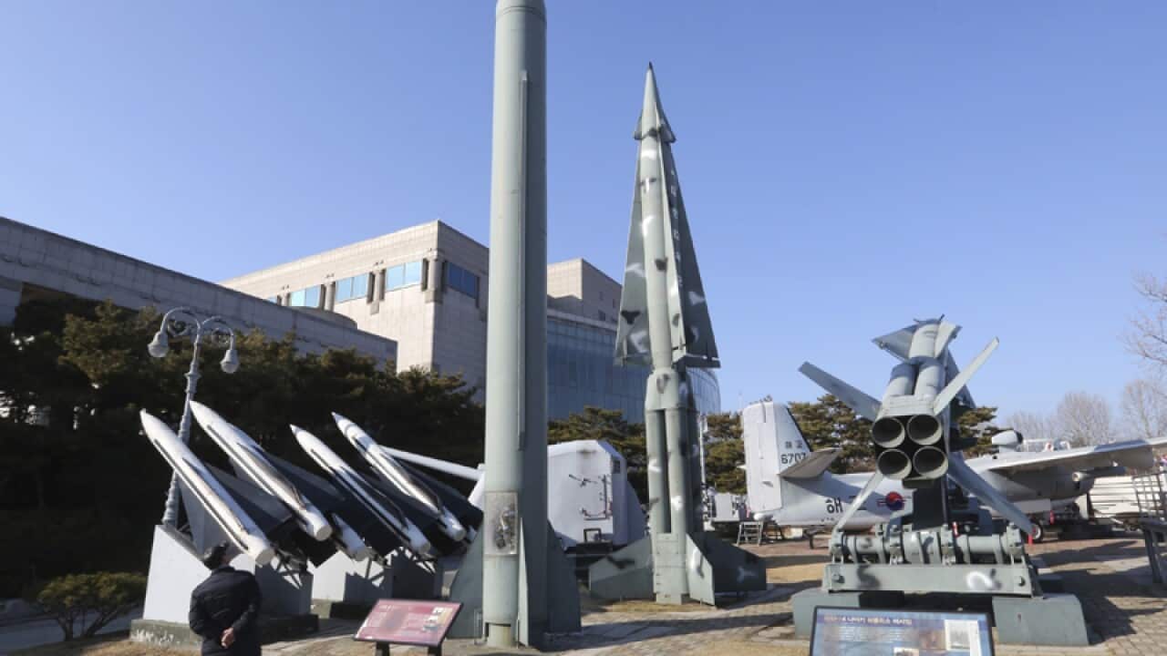 A mock North Korean Scud-B missile (CL) and South Korean missiles