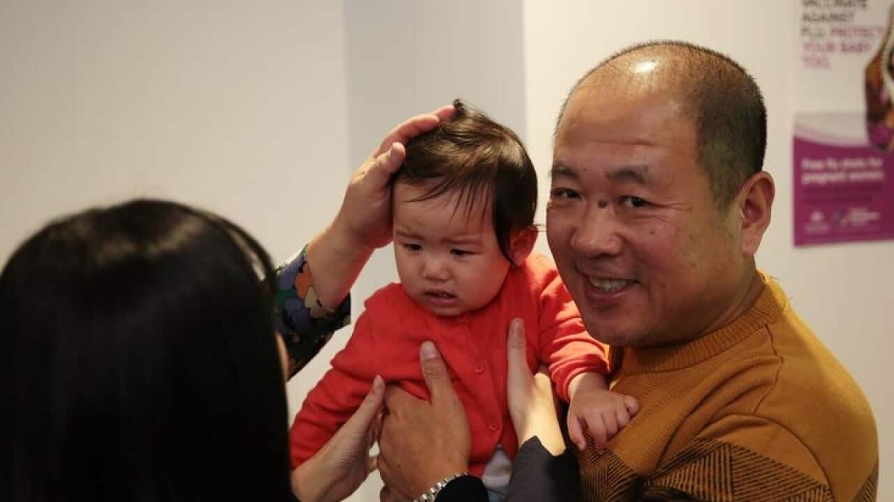 Baby Alina getting a flu shot