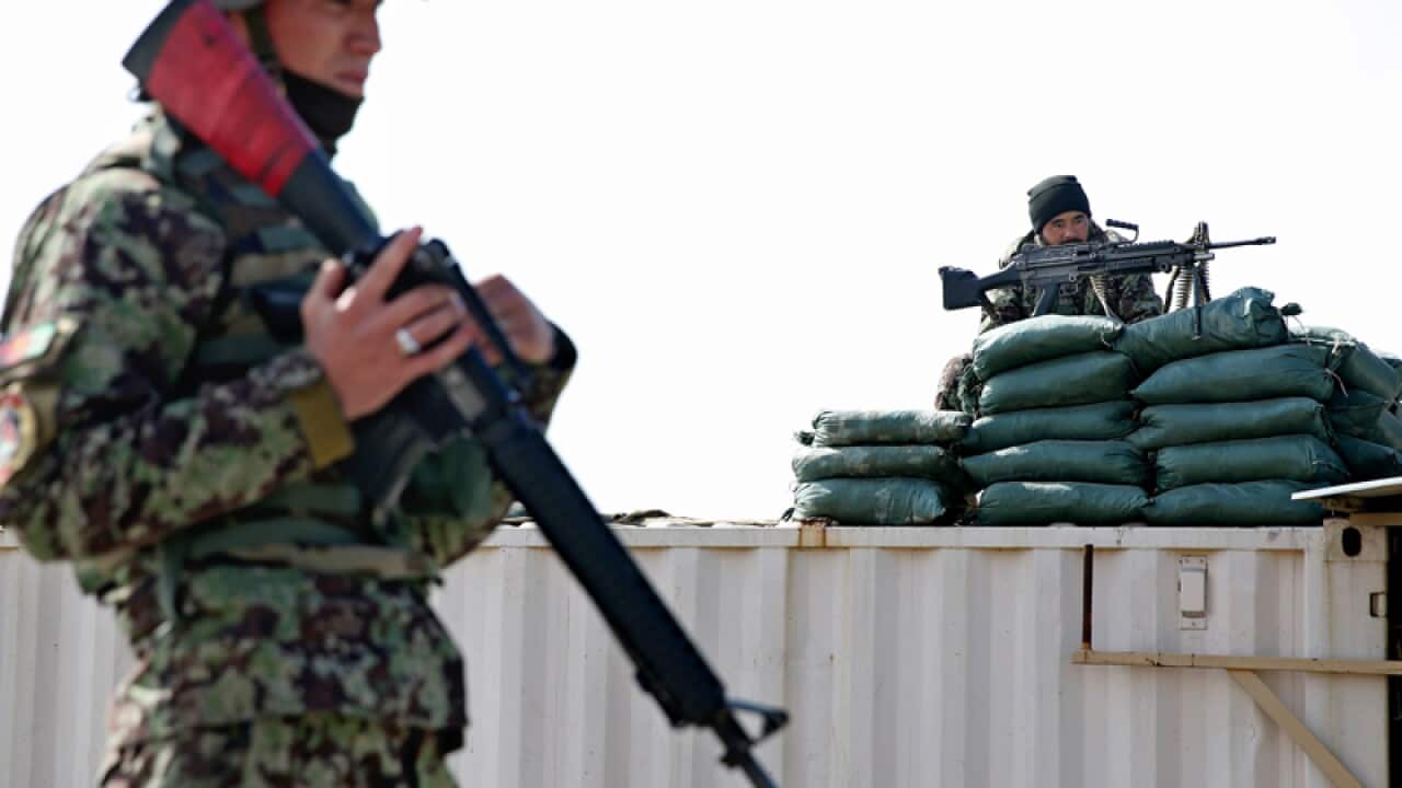 Afghan soldiers guard at the Parwan Detention Facility Center, Bargam