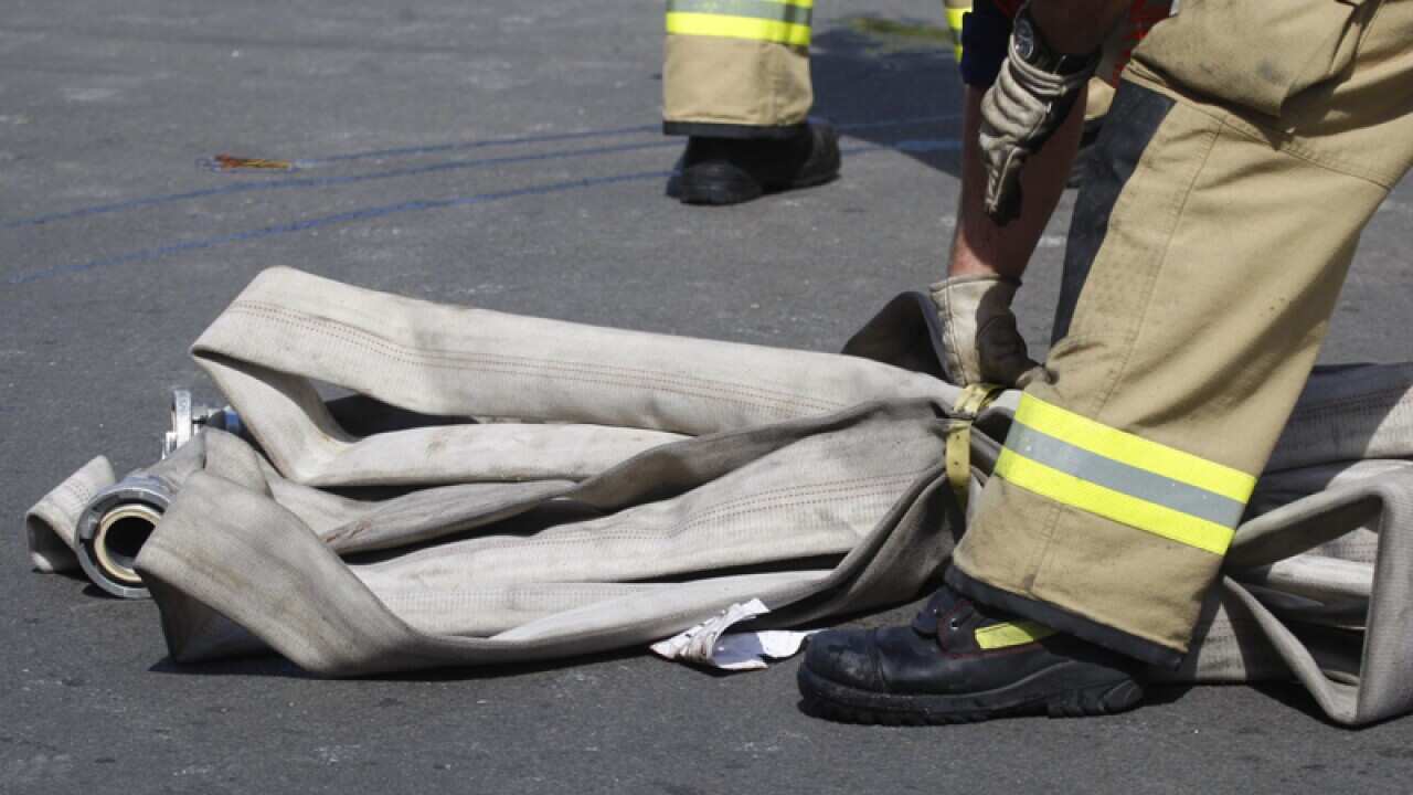 Firefighters at the scene of a fire