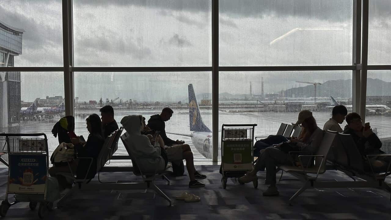 Two people dead after plane slides off runway and into sea in Hong Kong