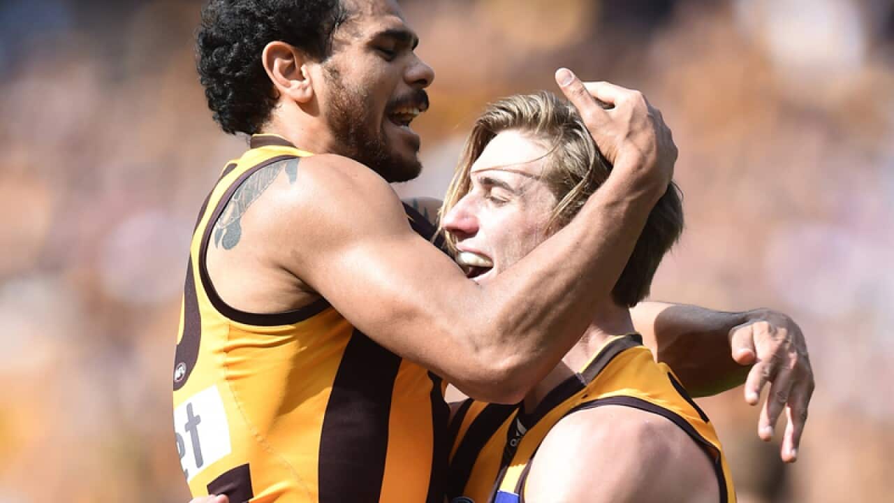 Hawthorn Hawks players Cyril Rioli (left) and Ryan Schoenmakers.