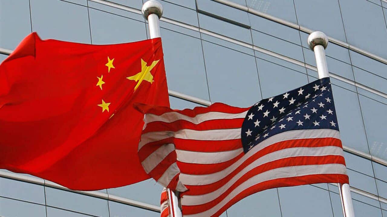 A US and a Chinese flag