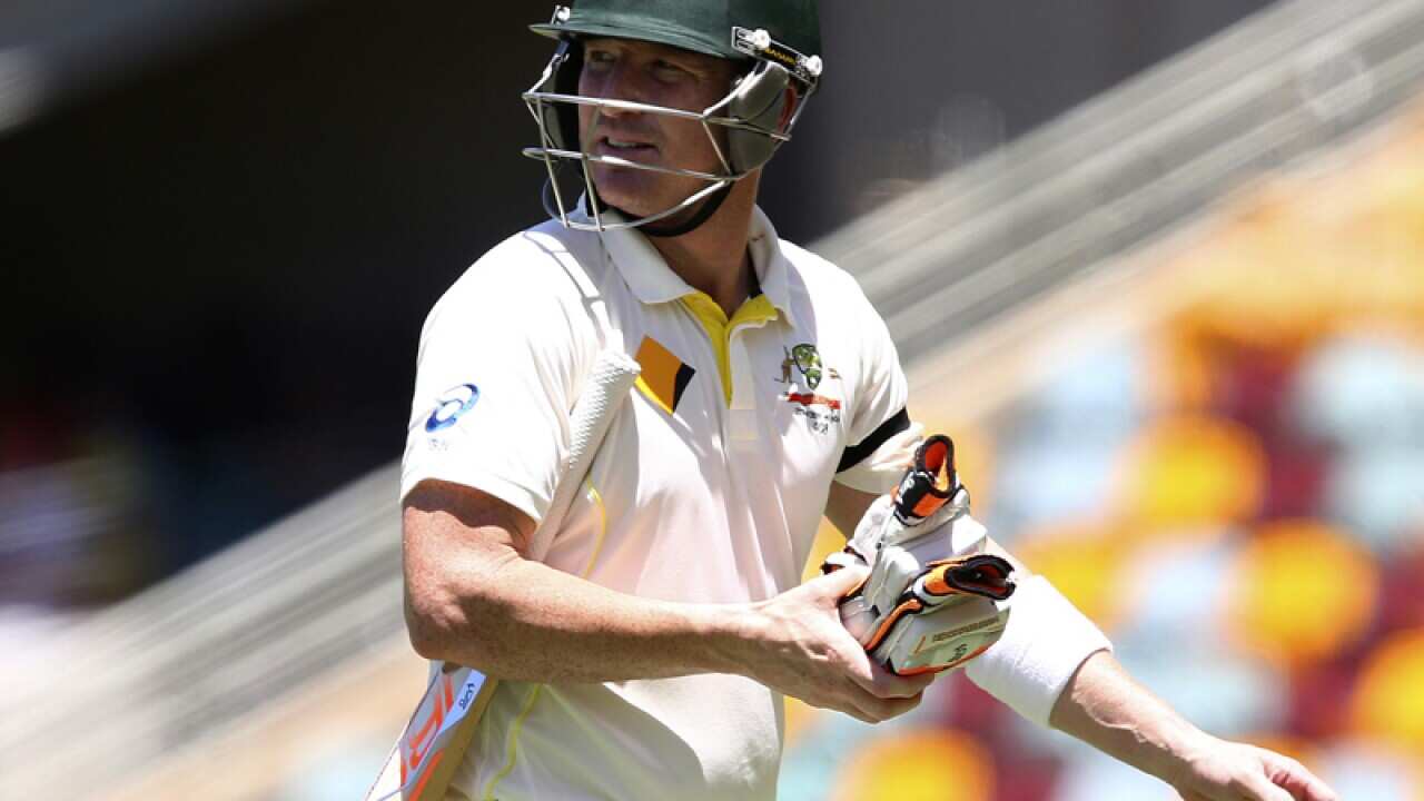 Australia's Brad Haddin walks of the field after his wicket fell