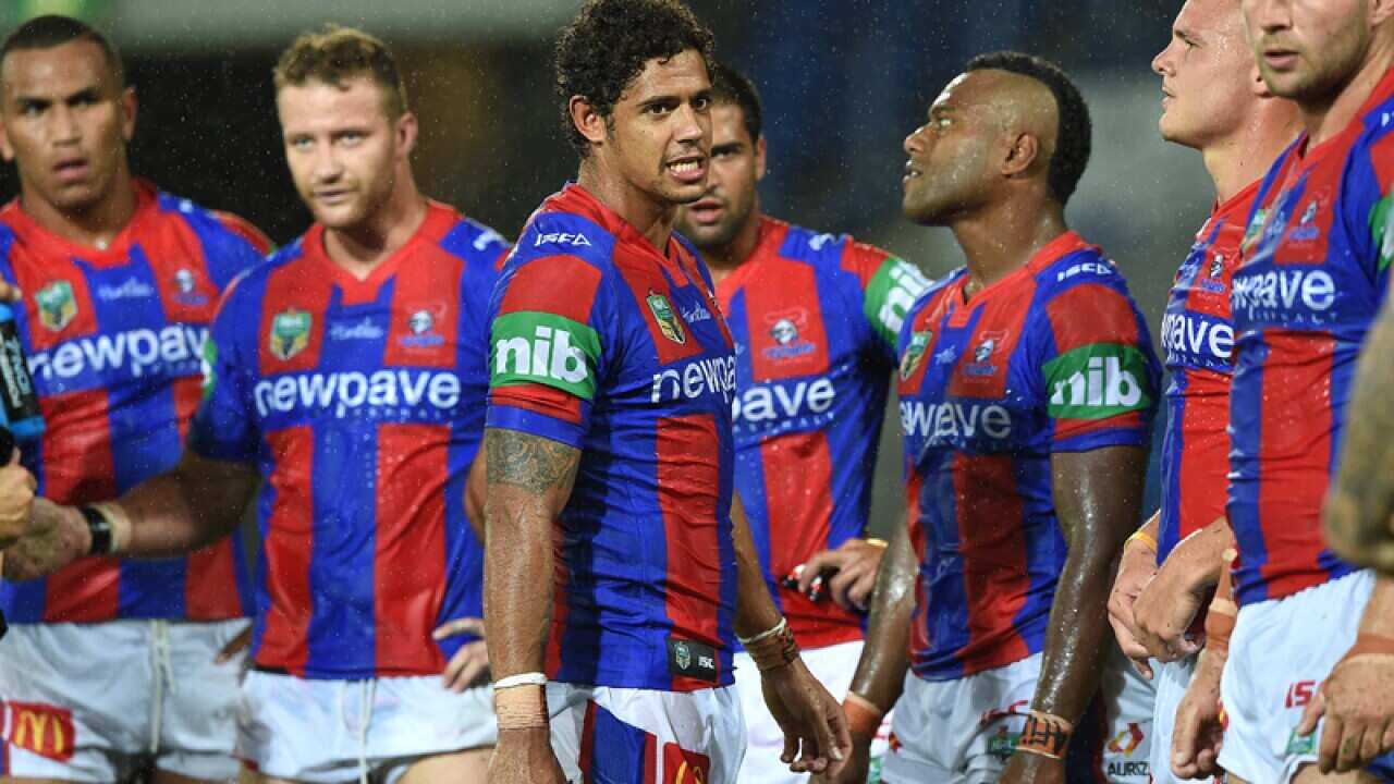 Knights players look on during the Round 1 NRL