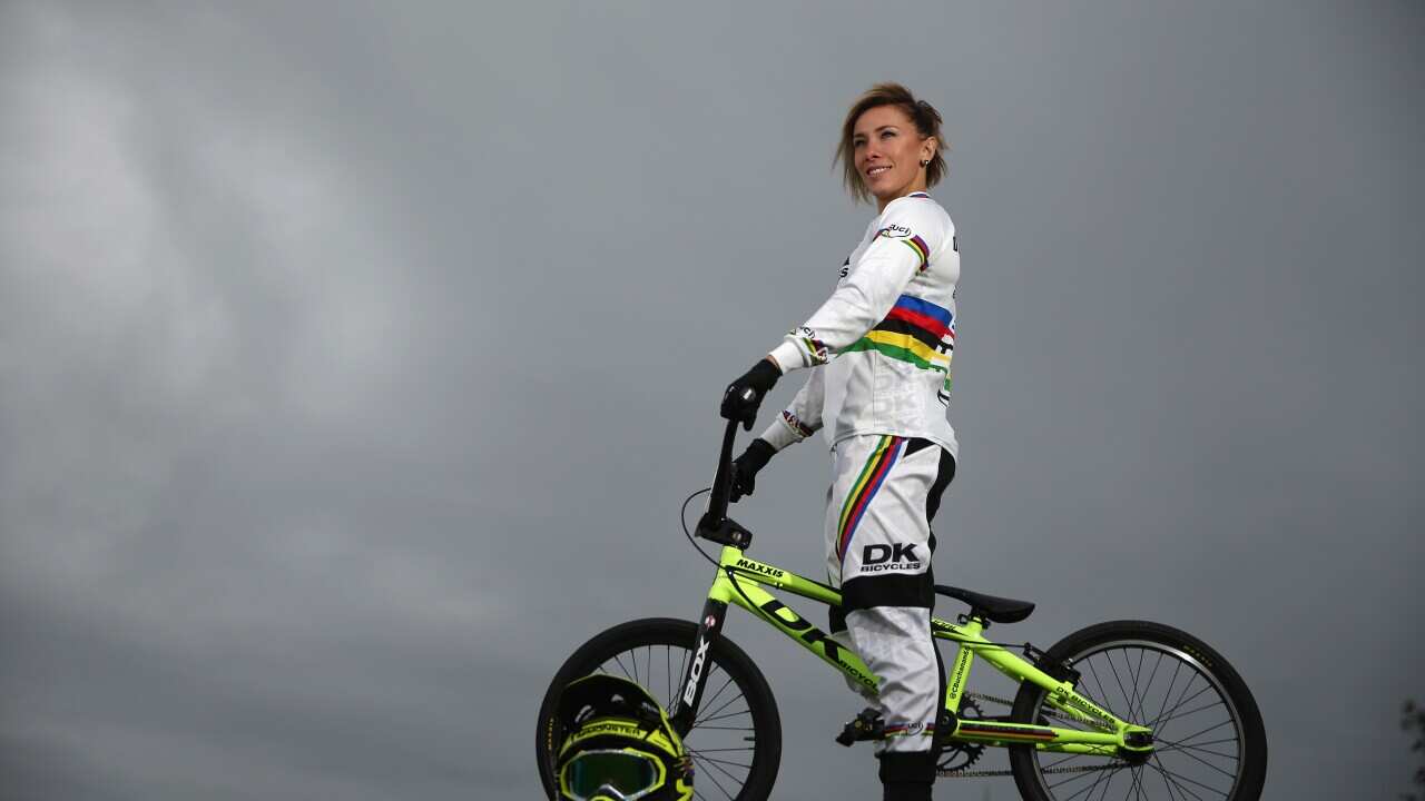 Caroline Buchanan poses with her BMX bike