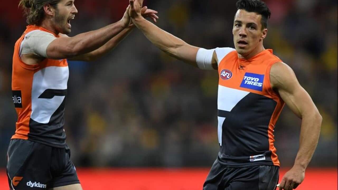 Dylan Shiel celebrates.