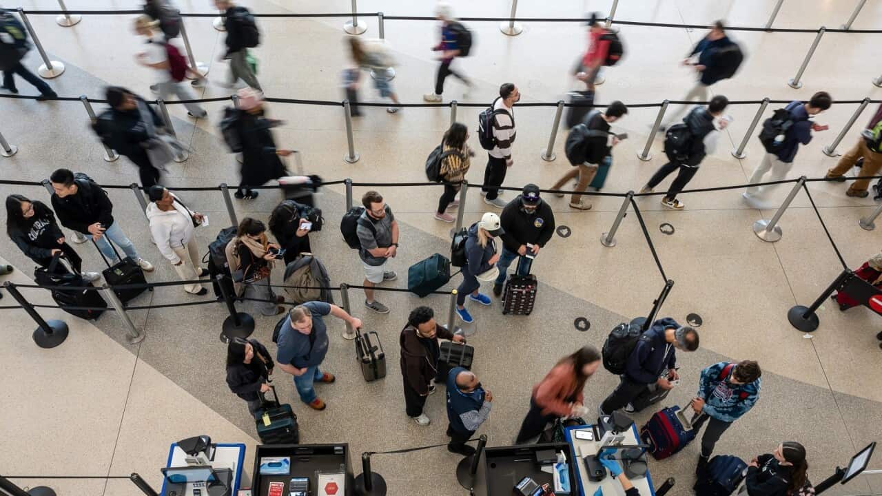 Travelers At SFO Airport Ahead Of Thanksgiving Holiday