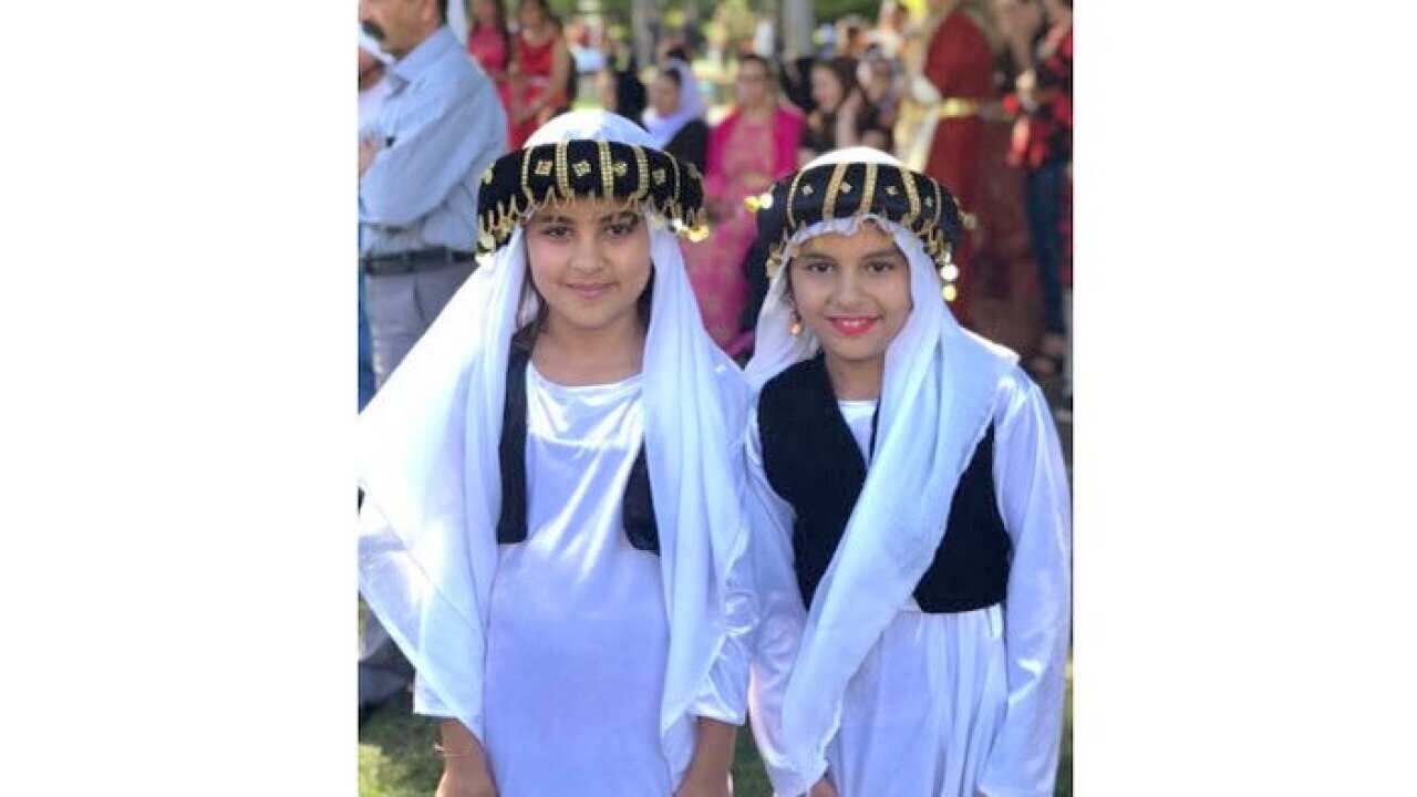 Young Yazidi girls celebrate the New Year in Toowoomba