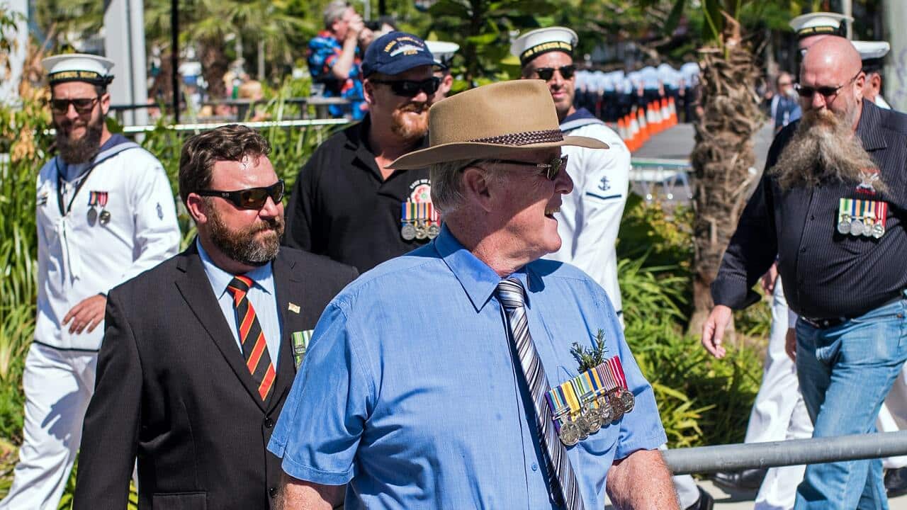 Picture of men who have served or are serving in the Australian Defence Force marching on ANZAC day, Cairns, Australia, 26 April 2018.