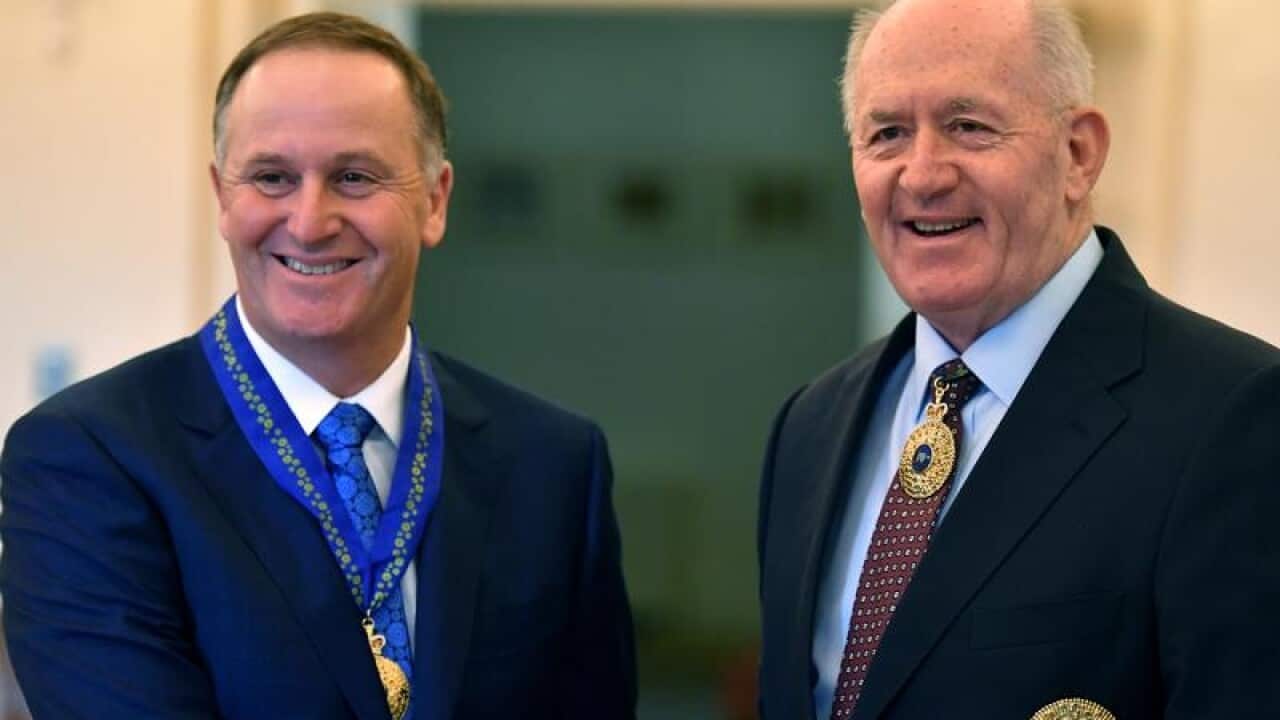 Former New Zealand PM John Key during a ceremony in Canberra