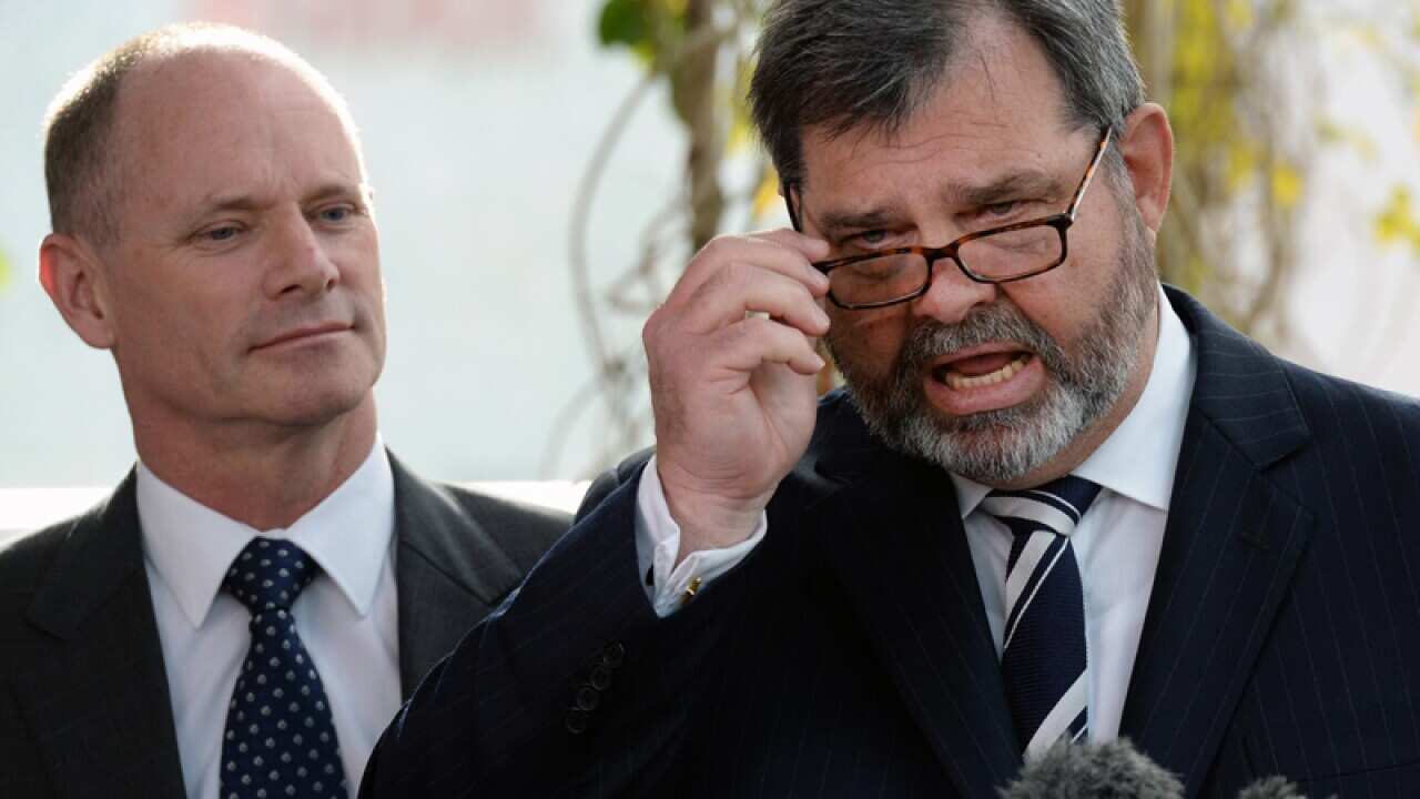 Queensland Chief Justice Tim Carmody (R) and Premier Campbell Newman