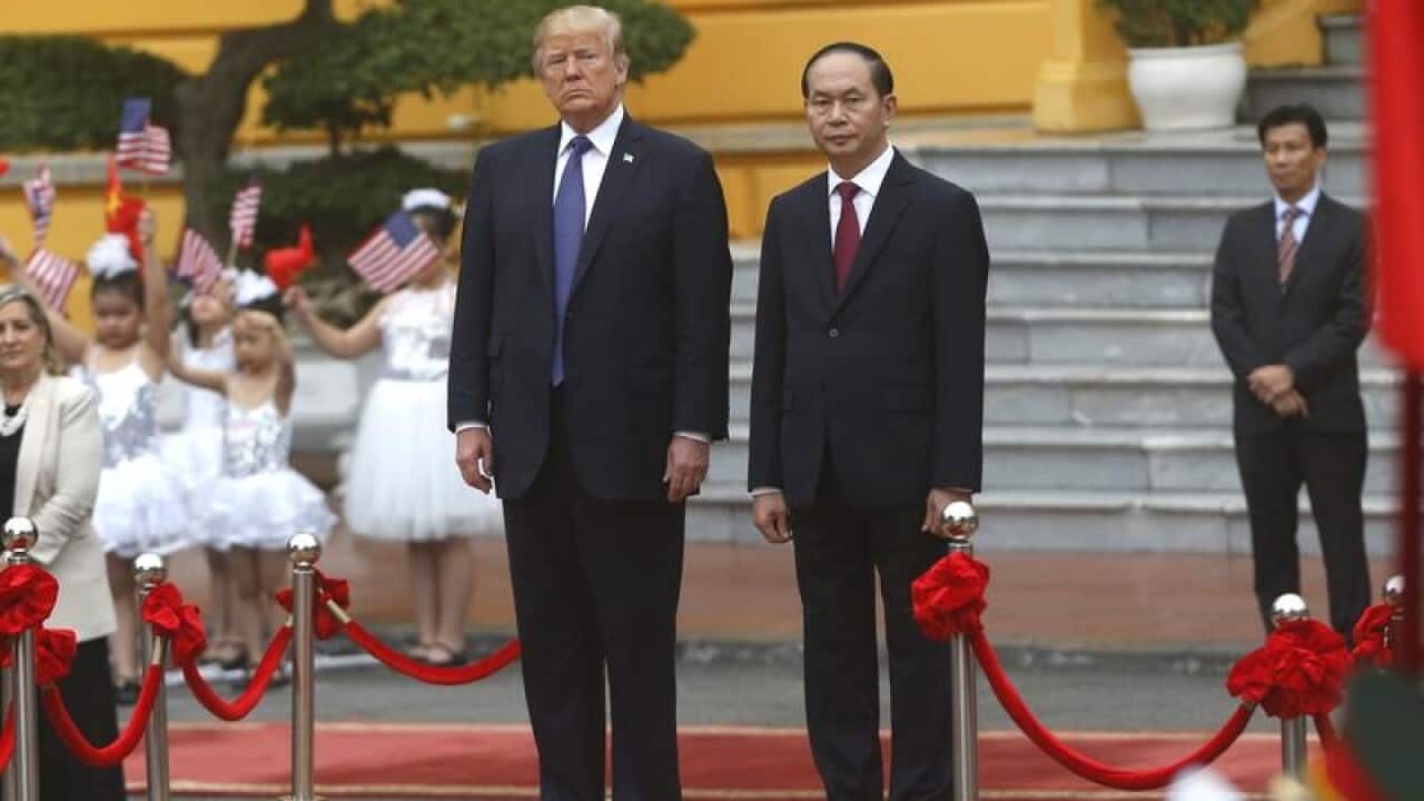 (Kham/Pool Photo via AP)