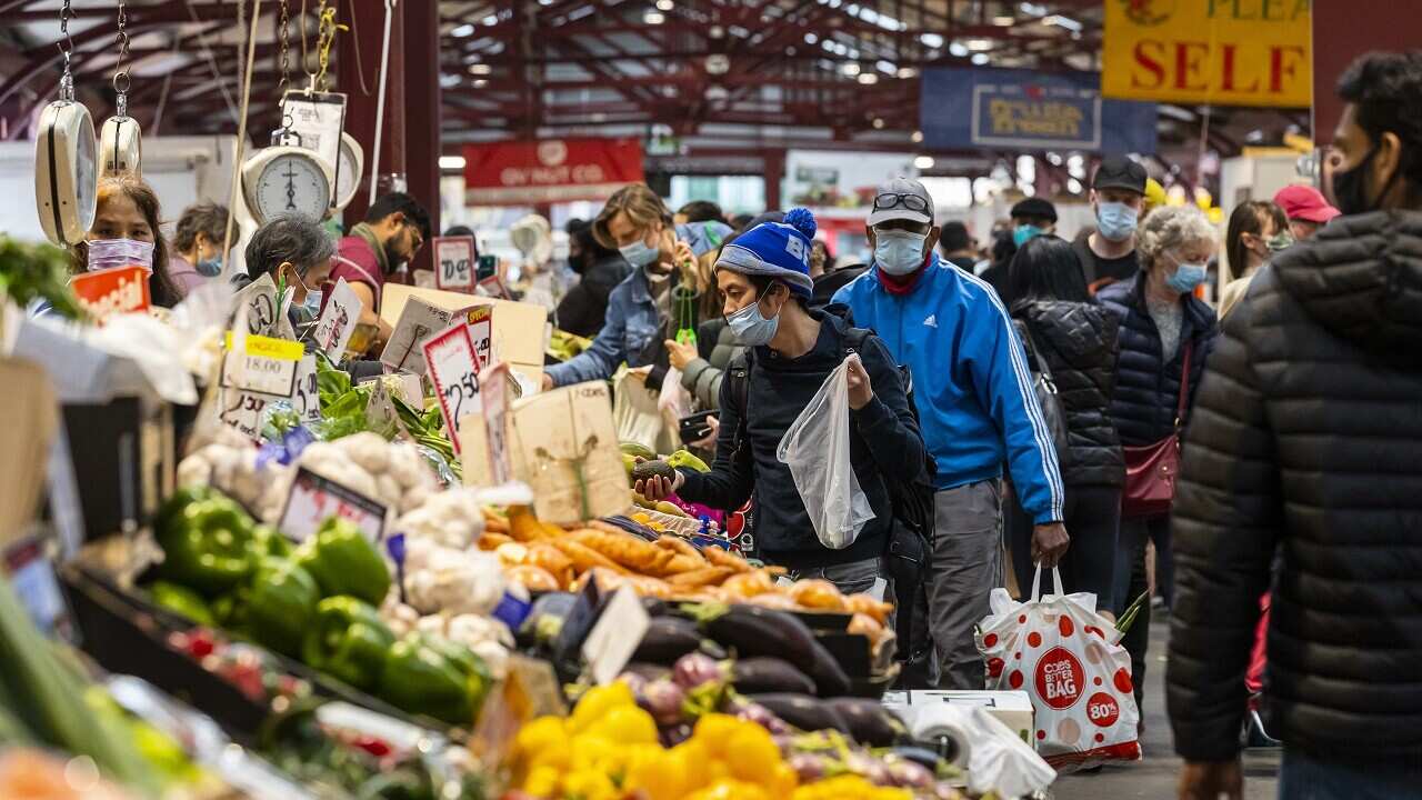 Customers are seen at the Queen Victoria Market in Melbourne, Saturday, October 23, 2021.