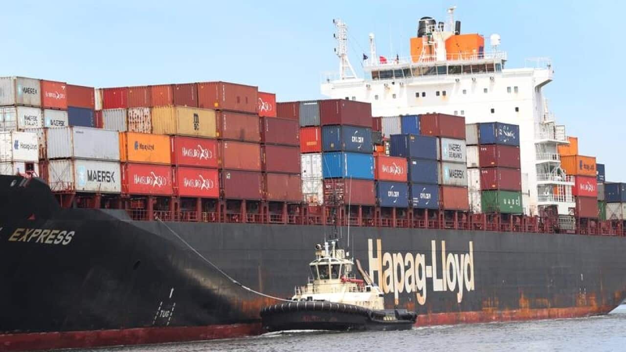 Cargo ship full of shipping containers.