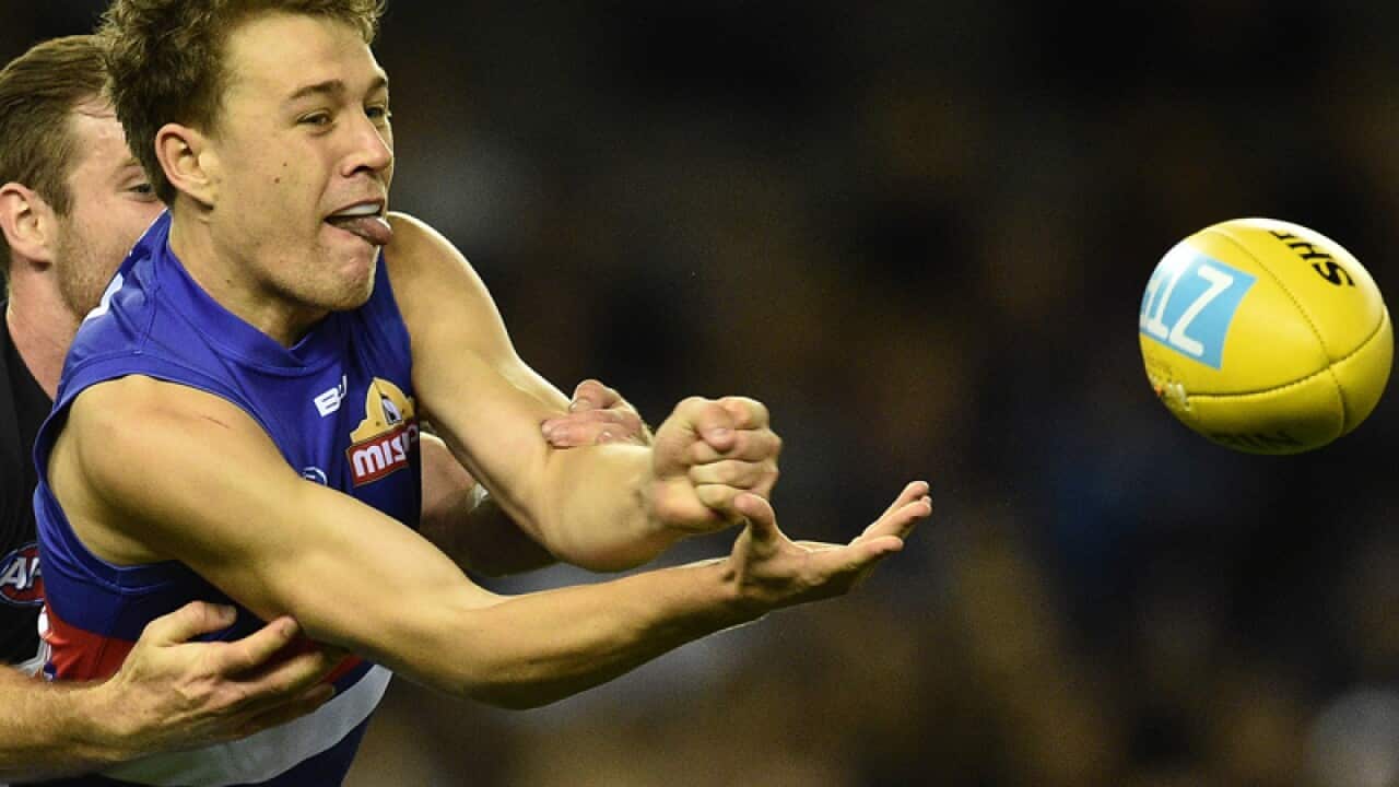 Jack Macrae (right) of the Bulldogs