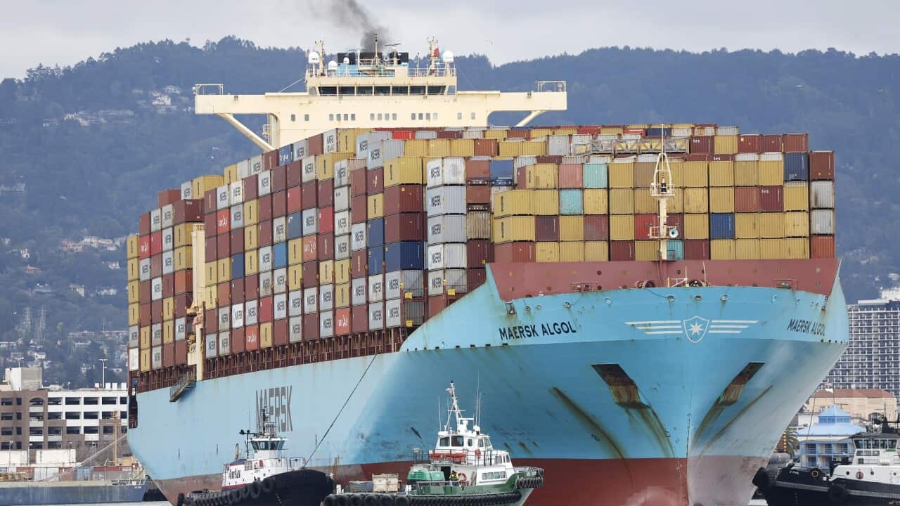 A container ship brings imports into the Port of Oakland in California (AAP)