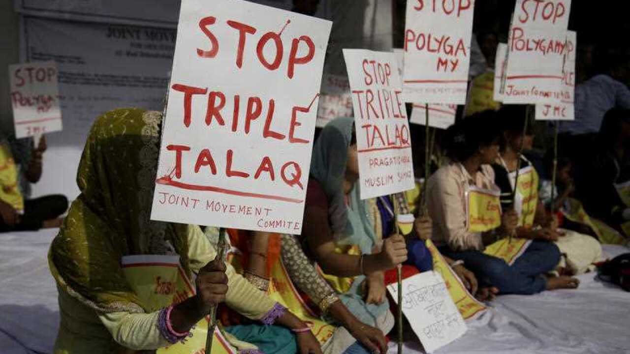 Activists of various social organisations hold placards during a protest against "Triple Talaq", a divorce practice prevalent among Muslims in New Delhi, India, Wednesday, May 10, 2017