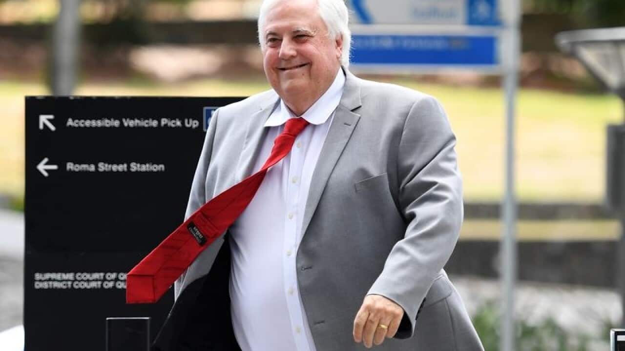 Clive Palmer arriving at the Supreme Court in Brisbane in February.