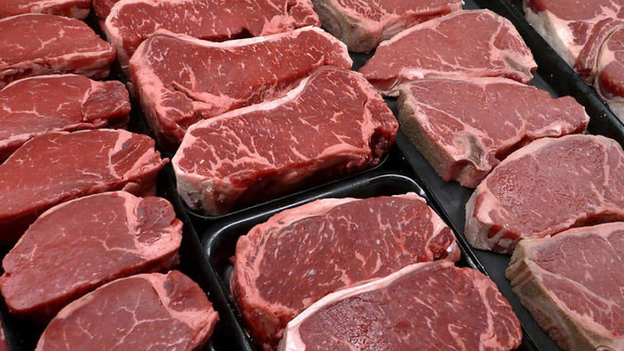 FILE - In this Jan. 18, 2010 file photo, steaks and other beef products are displayed for sale at a grocery store.