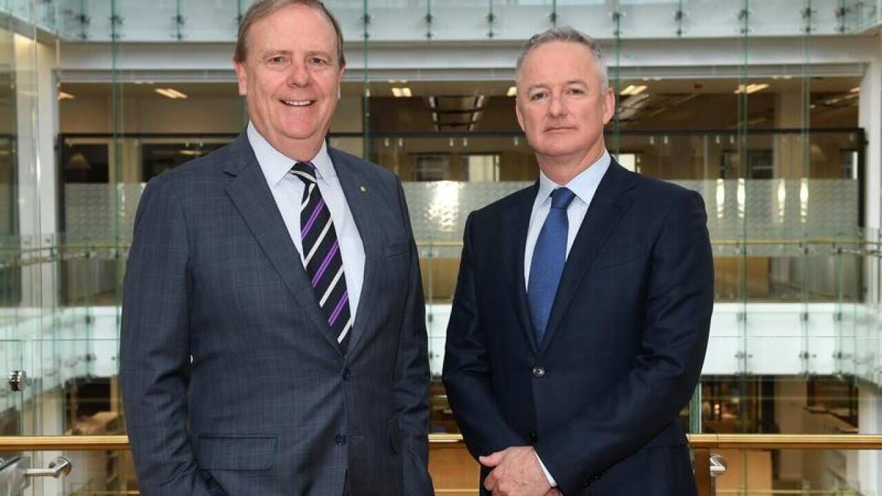 Nine Ent Chairman Peter Costello and CEO Hugh Marks pose for photo.