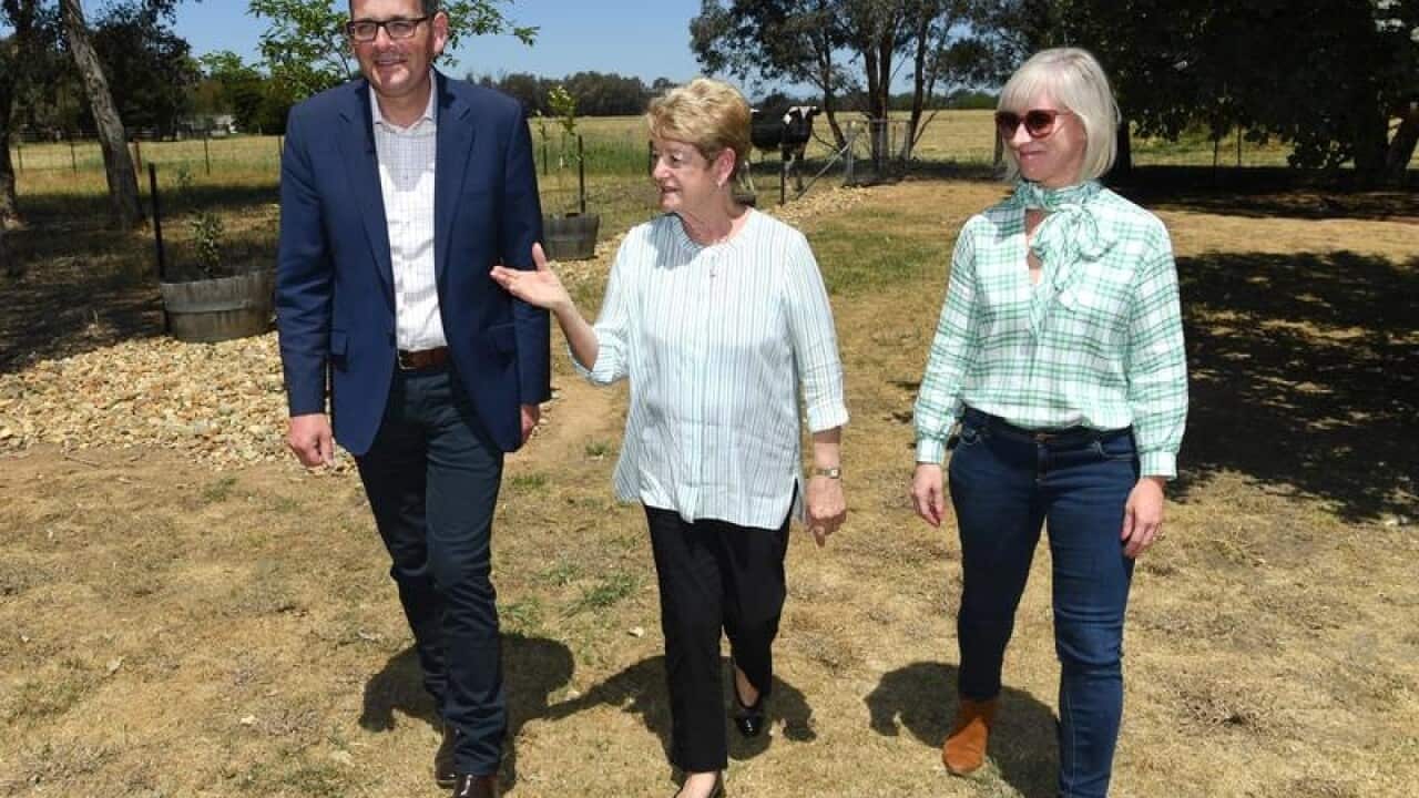 Premier Daniel Andrews, his mum Jan and wife Cath at his mum's home.