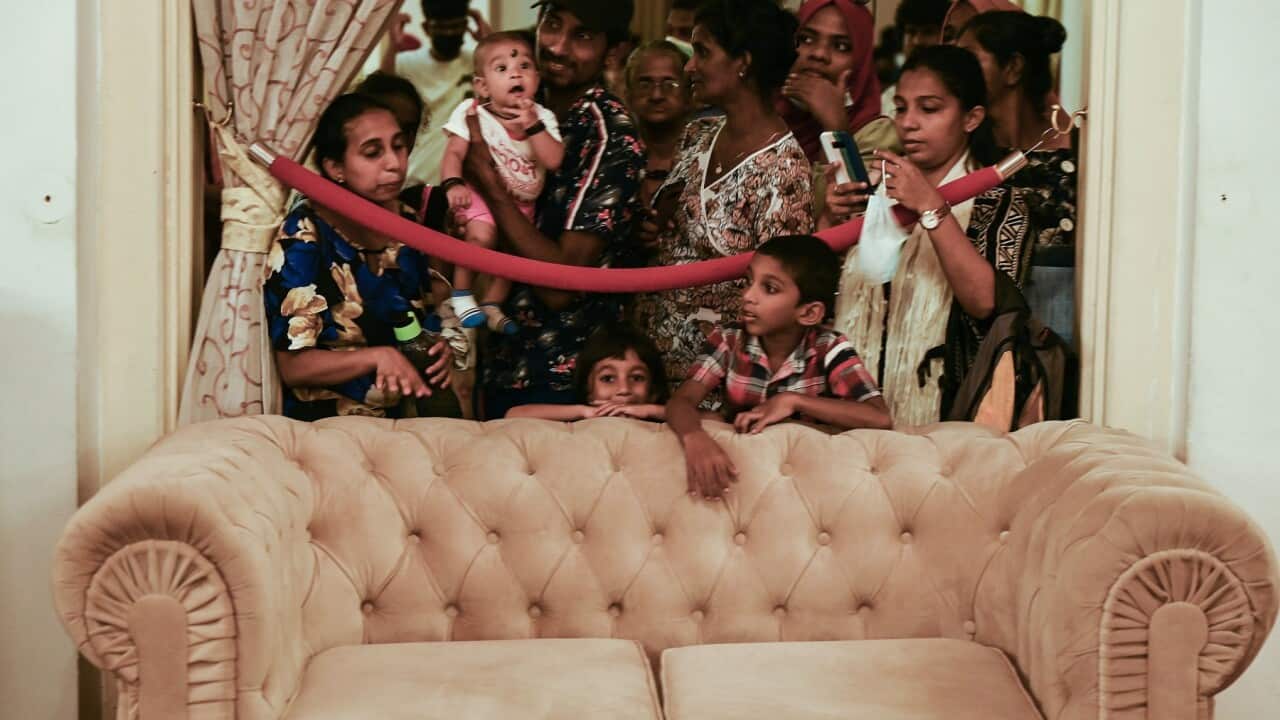 People visit Sri Lankan President Gotabaya Rajapaksa's official residence in Colombo on July 12, 2022, after it was overrun by anti-government protestors on July 9. (Photo by Arun SANKAR / AFP) (Photo by ARUN SANKAR/AFP via Getty Images)