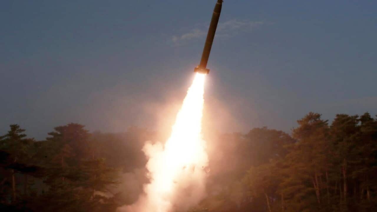 A photo released by the official North Korean Central News Agency (KCNA) shows a separate missile launch on March 10.