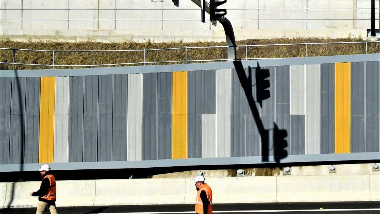Infrastructure spending, record debt and deficit for Australia's crisis budget.